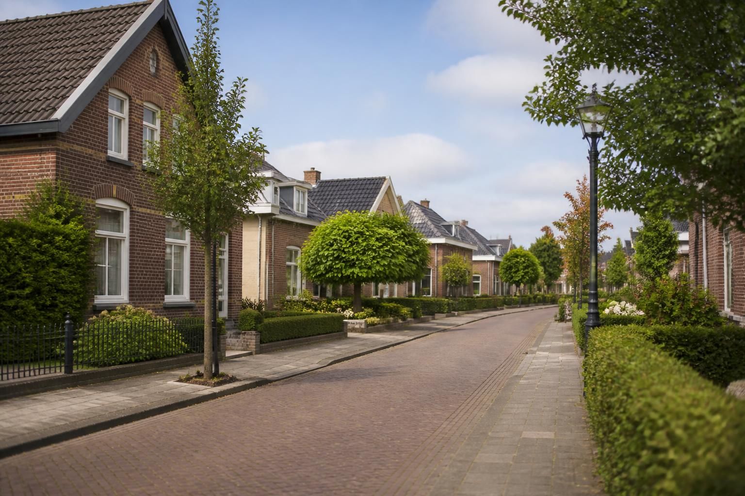 Small-town neighborhood with neat homes in Didam.